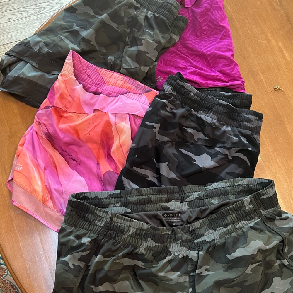 5 pair of Athleta running shorts size XL.
